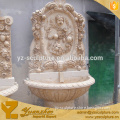 Sunset red stone marble wall fountains carved child relif and flowers